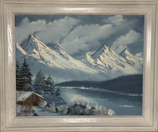 98 Oil painting on 16x20 canvas set within wood frame painted white, Winter landscape with mountain range, cabin and lake.