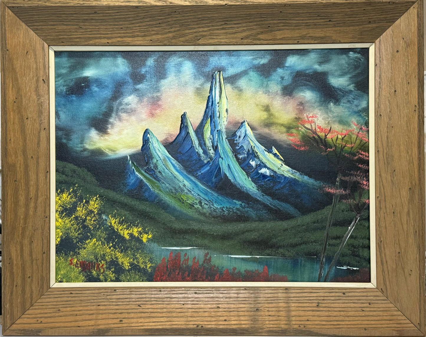 96 Oil painting on 12x16 canvas set within wood frame with white trim. Alien planet landscape with lake, trees and mountain range.