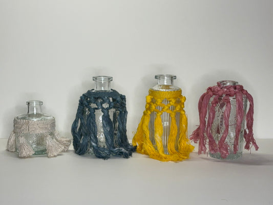 R Glass bottle with tassel decoration